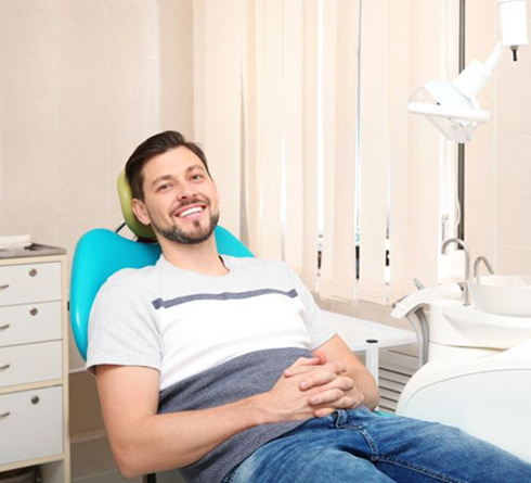 Relaxed patient in dental treatment chair